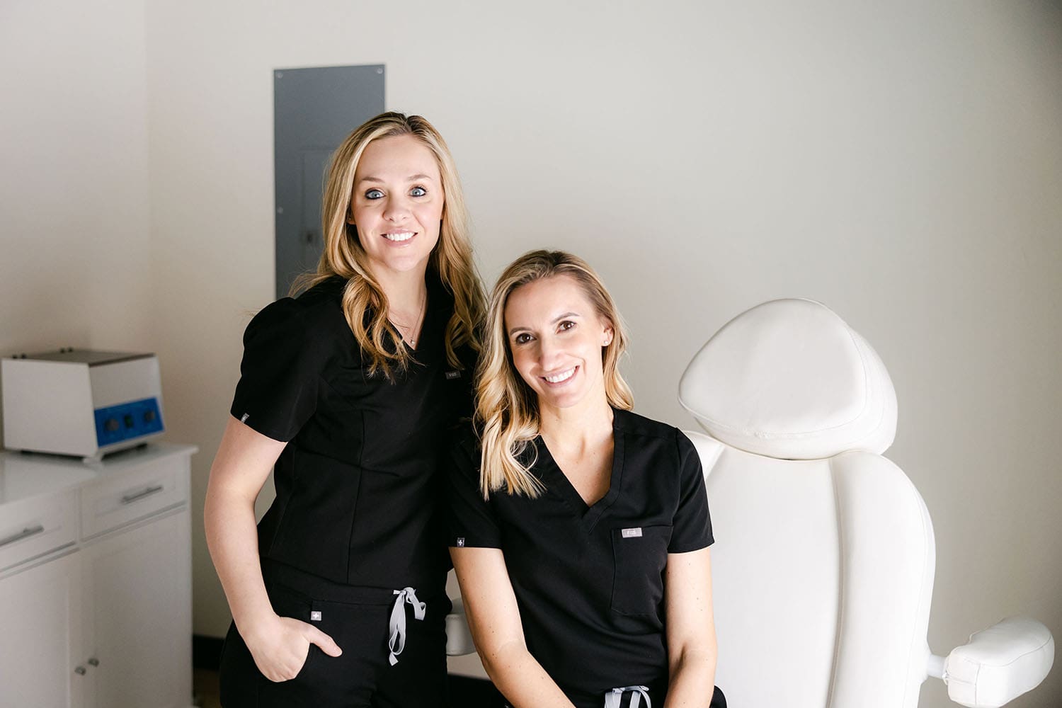 Amber and Lindsay in black medical uniform