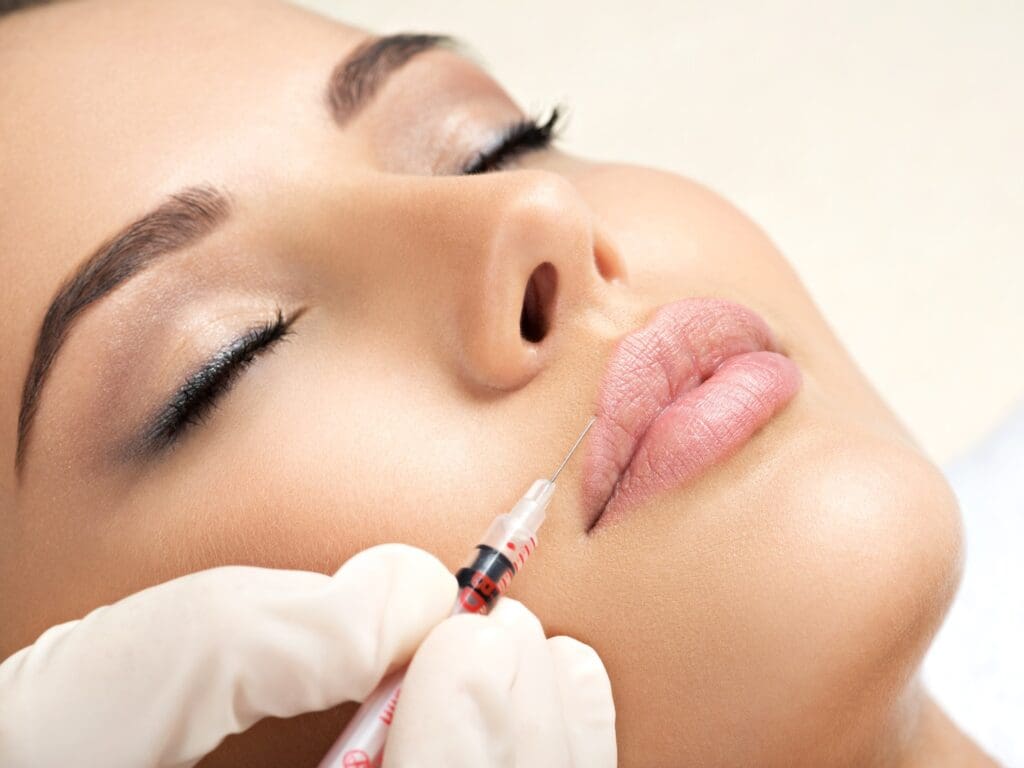 Closeup of woman getting botox injection